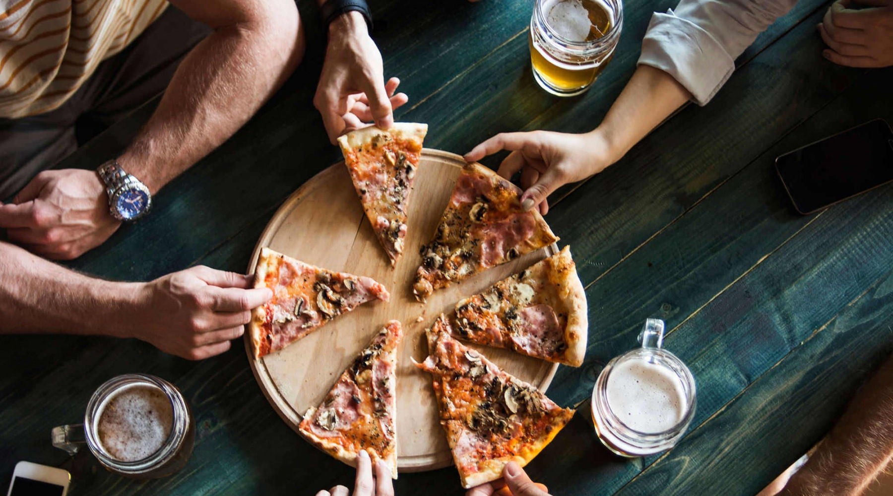 people eating pizza